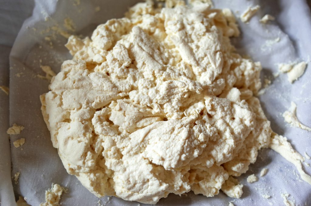 Soy Milk Curds in cheesecloth as a making homemade tofu stage