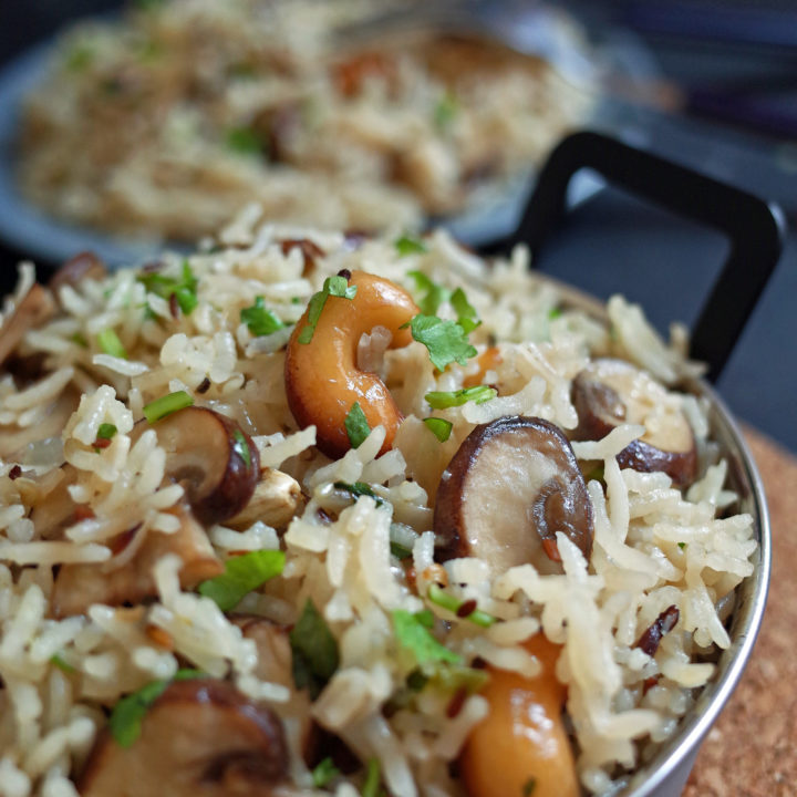 A bowl of mushroom and cashew nut pulao rice