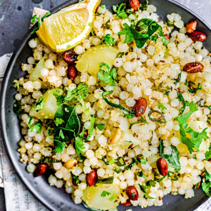 Sabudana khichdi in a black plate.