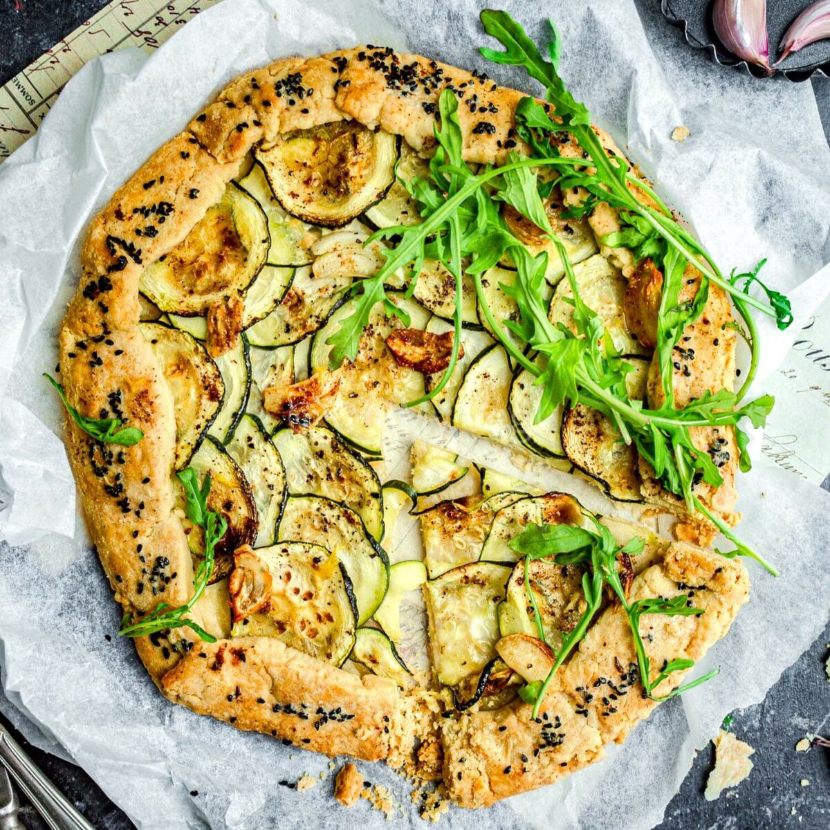 Courgette galette with garlic butter.