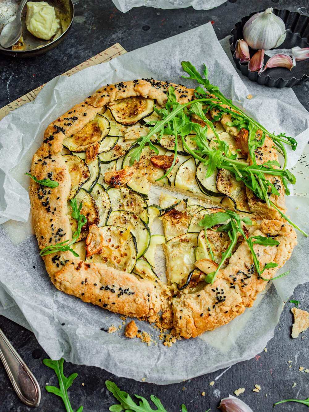 Courgette galette with a slice taken out. 