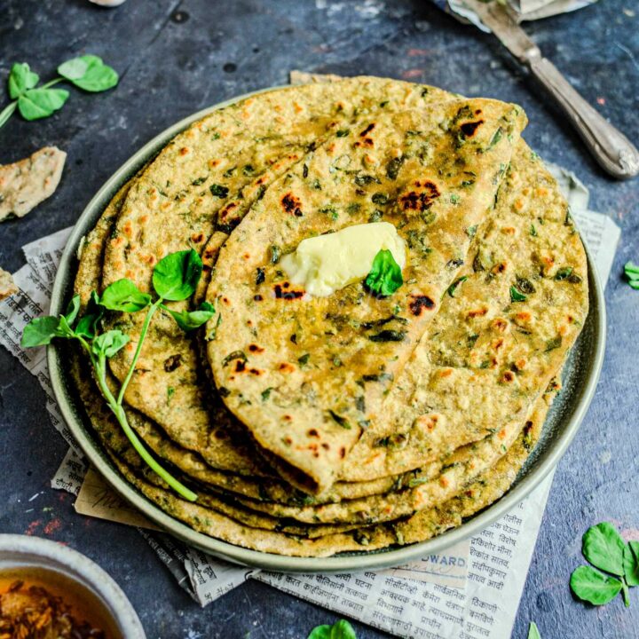 Methi paratha in a stack.