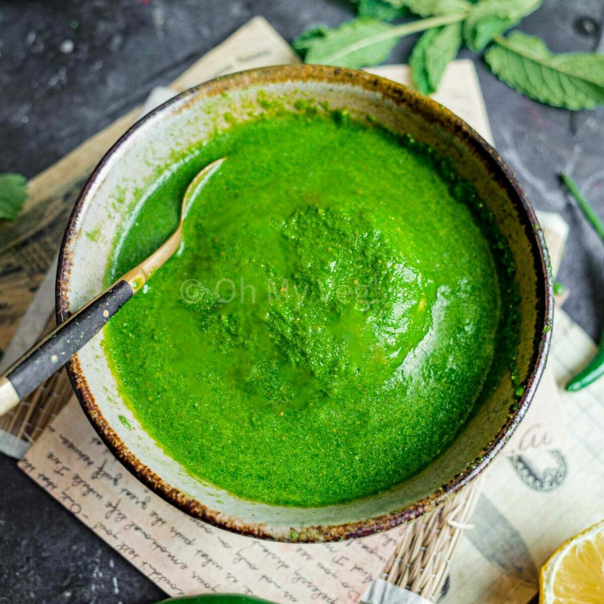 Green chutney for chaat in a small bowl.