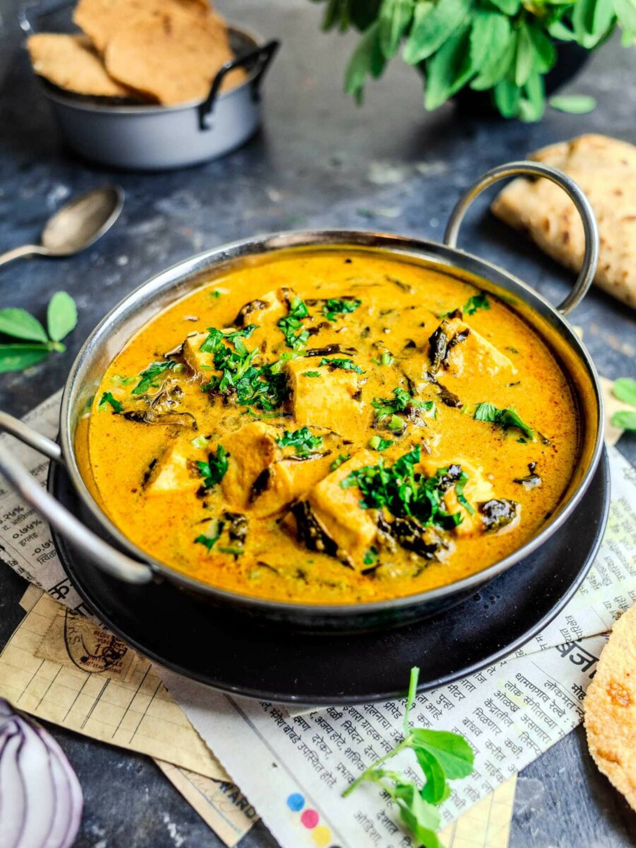 Methi malai paneer in a serving kadai.