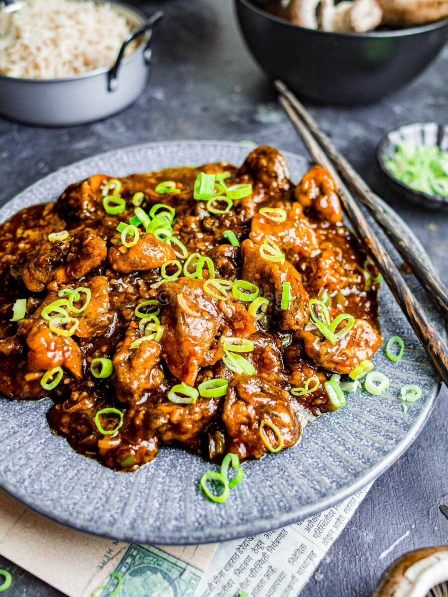 Indo Chinese mushroom curry on a plate.