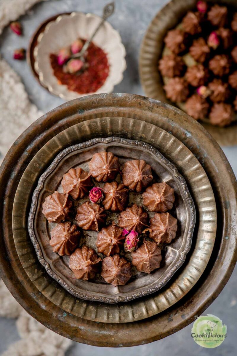 Chocolate modak on a steel plate.