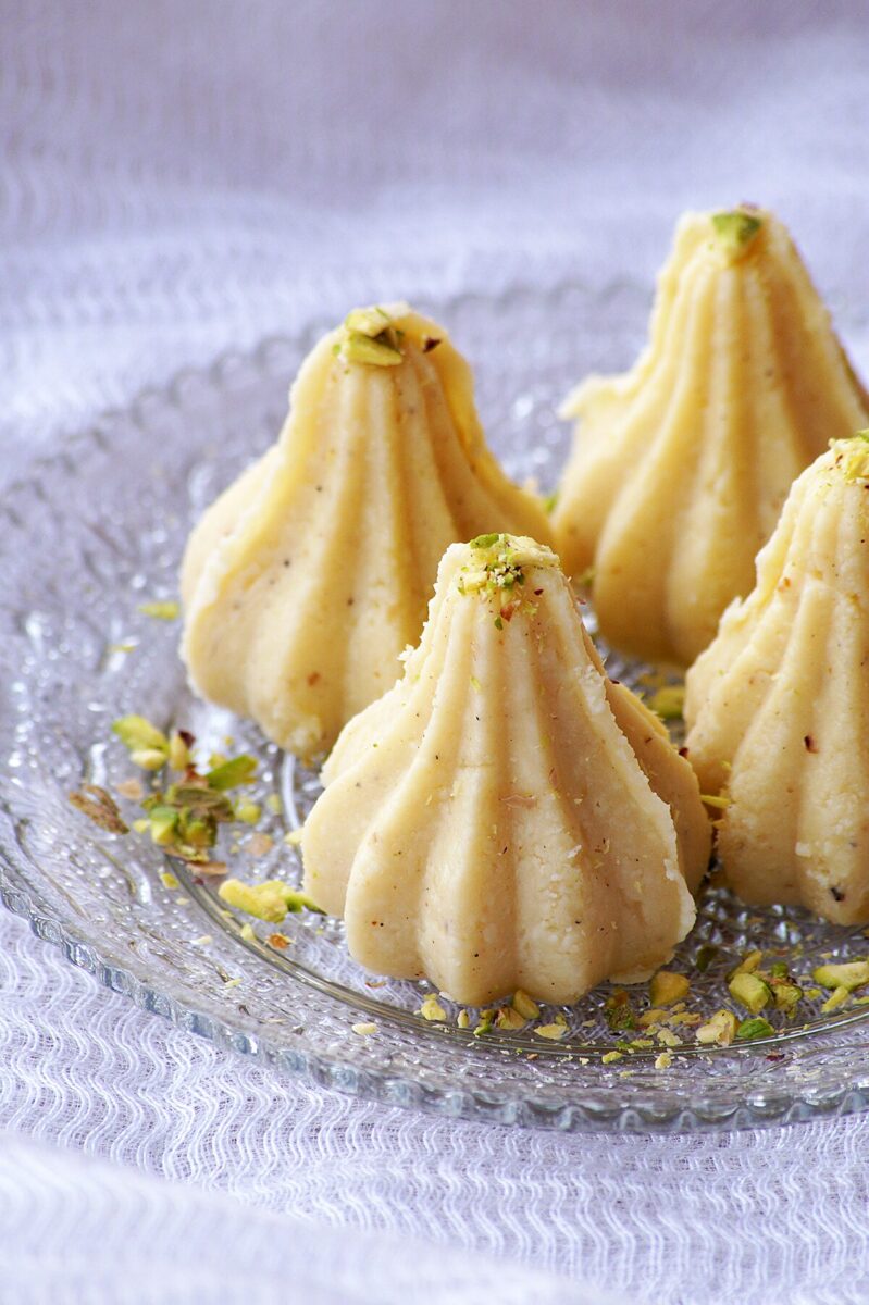 Malai modak with pistachios.