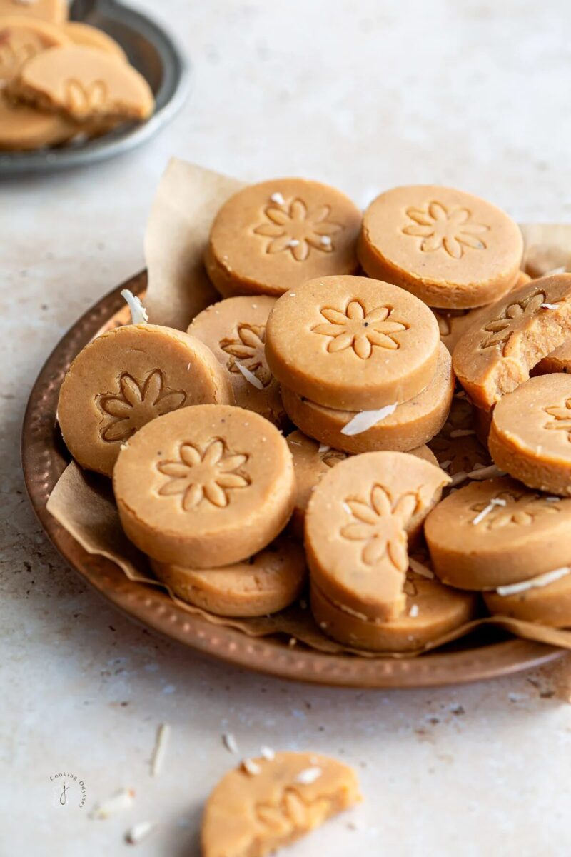 Caramel badam malai peda on a plate.