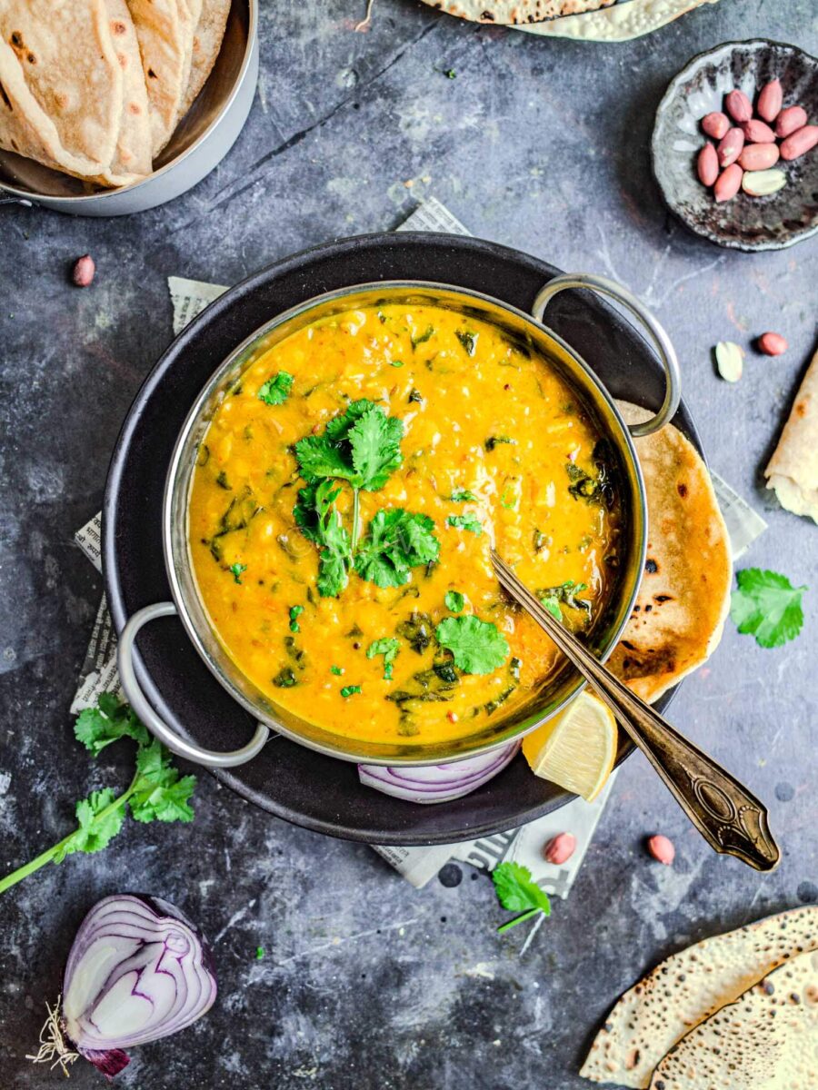 Dal bhaji with lime, onion, and chapati.