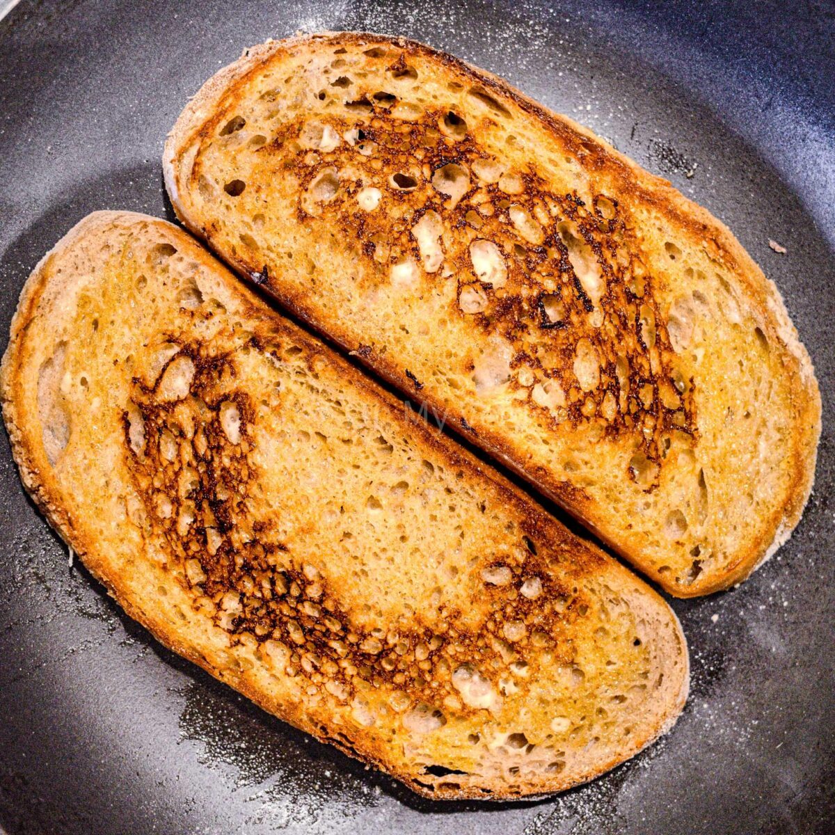 Toasted bread in a pan.