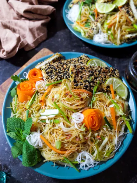 Vegan Vietnamese Cold Noodle Salad with Sesame Crusted Tofu on a blue plate