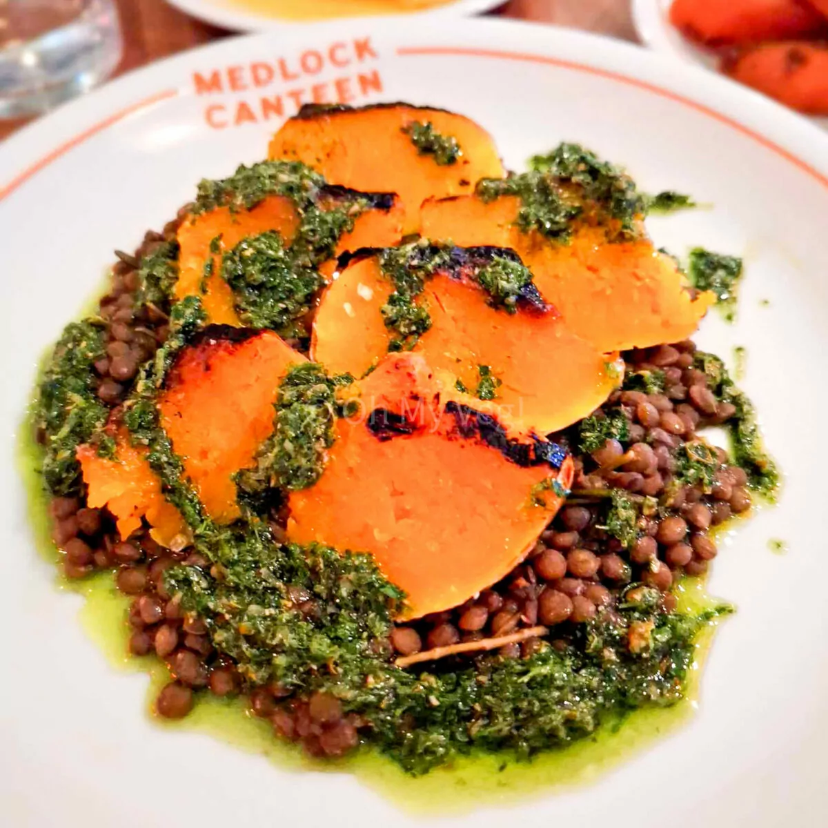 Medlock Canteen coal roast squash, braised puy lentils, and salsa verde.